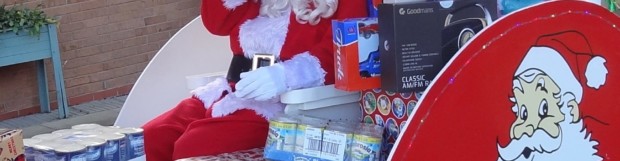 Santa’s wave brings cheer to kids – and to foodbanks too
